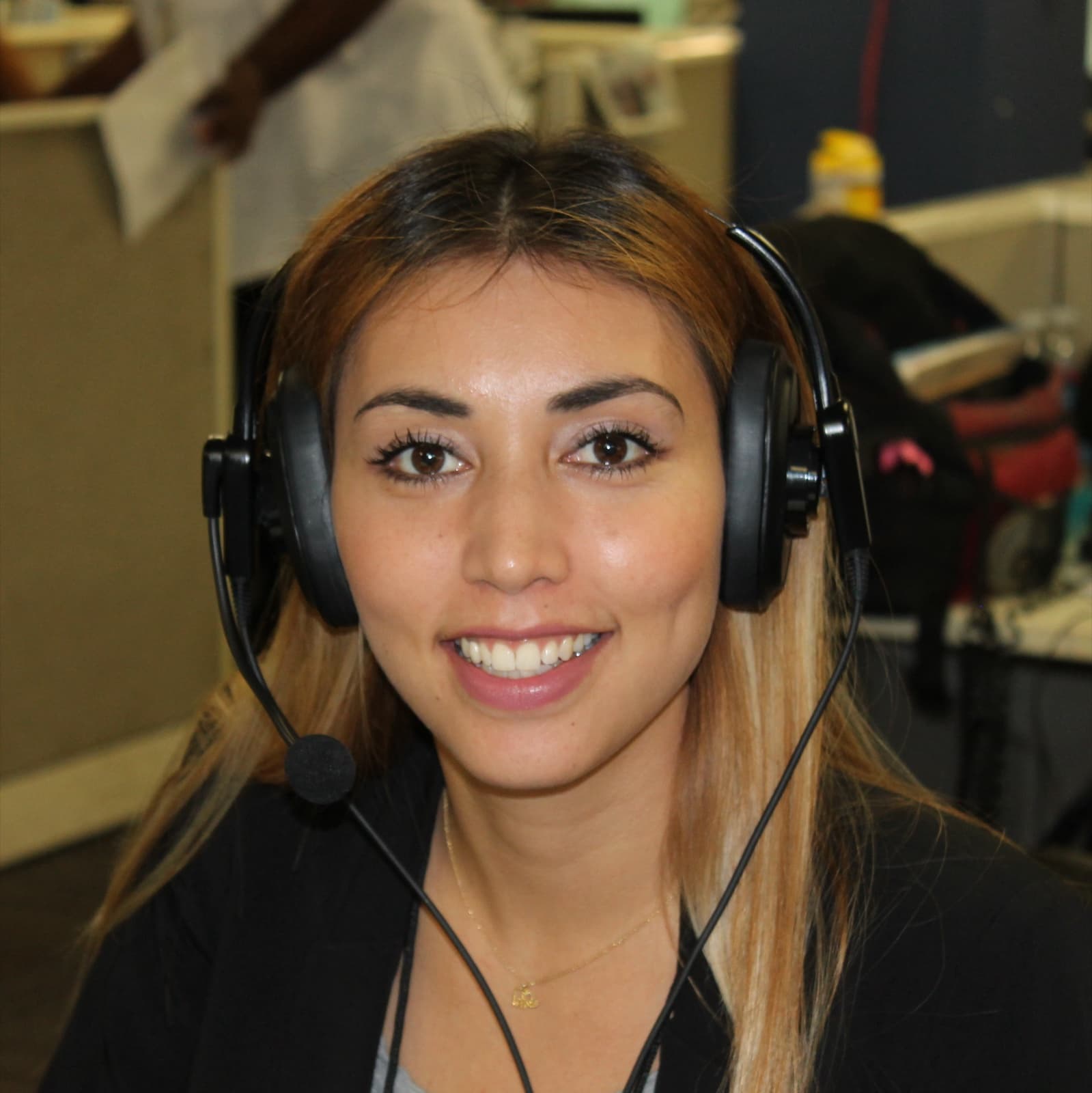 An SD&A inbound donor-support agent wearing a headset