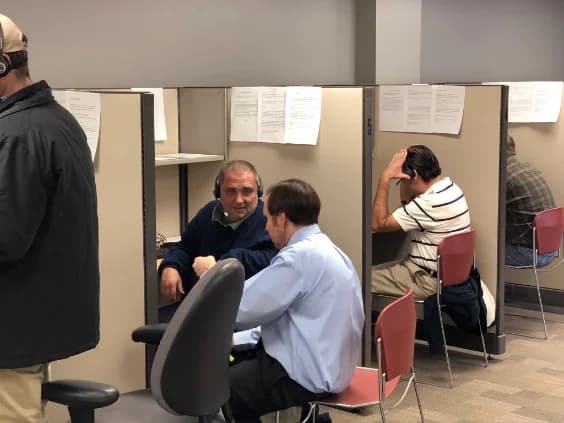 SD&A staff reviewing campaign materials