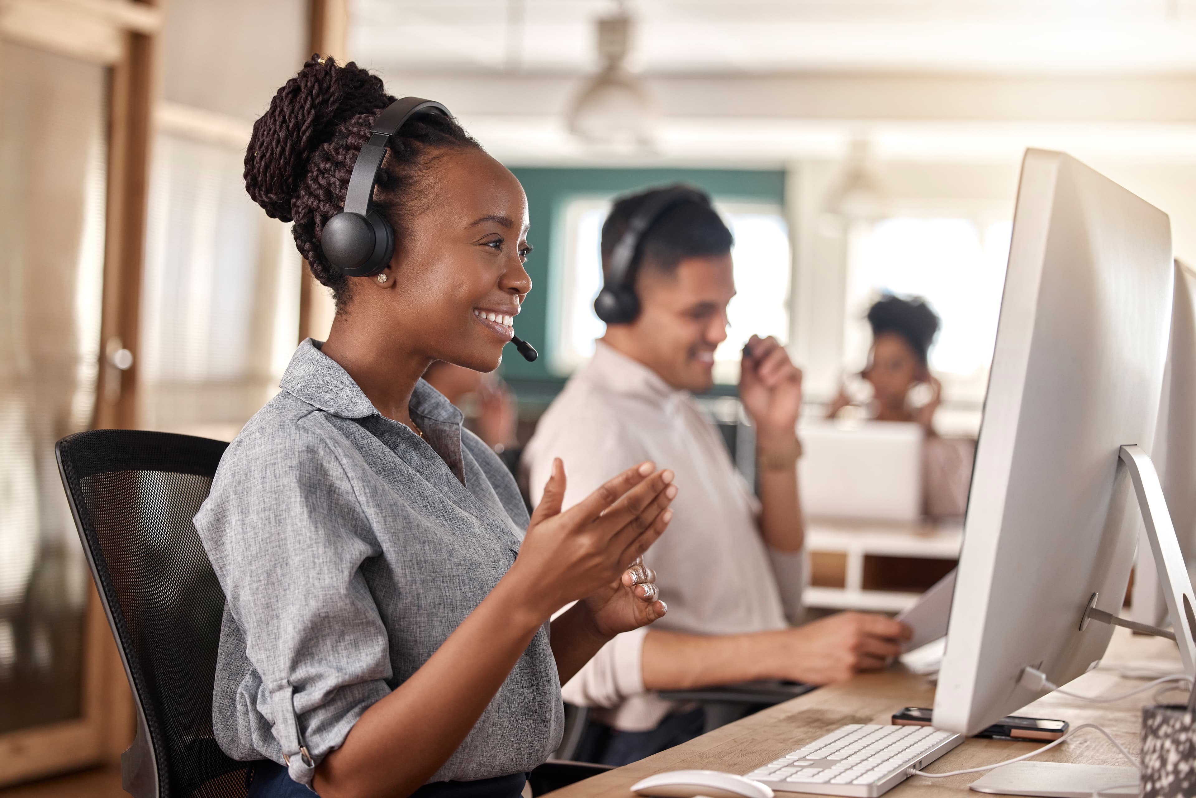 The SD&A call center team on headsets